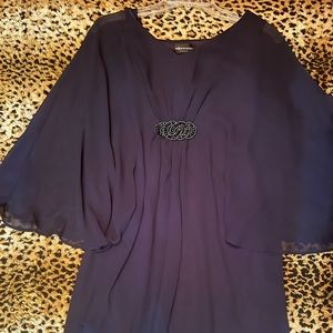 Navy dress with see through sleeves, metallic detail at bust